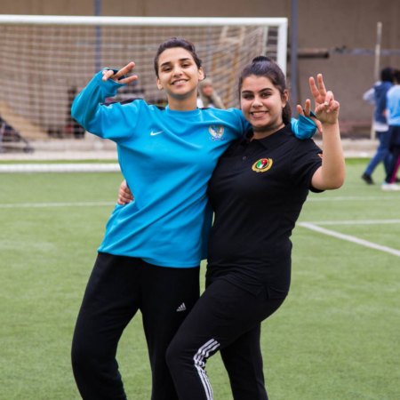 Having fun at the soccer field: two girls in Jordan