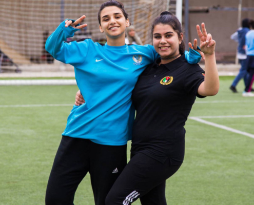 Having fun at the soccer field: two girls in Jordan